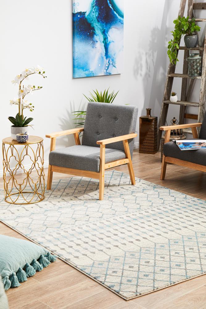 White Evoke Tribal heat set polypropylene rug by Turkey, showcasing intricate tribal patterns on soft, durable material.