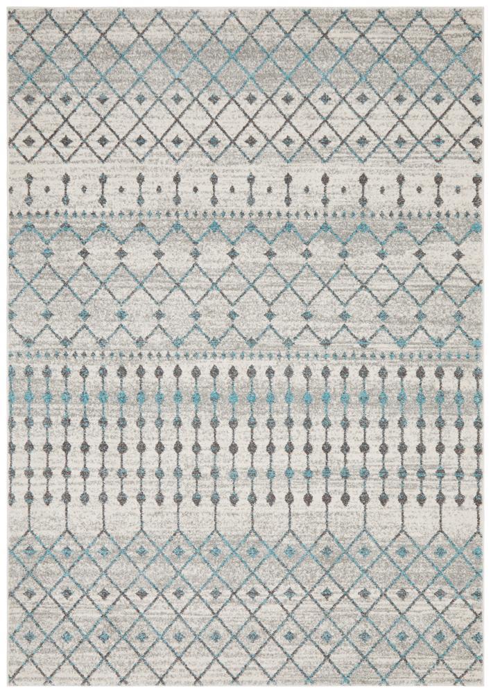 White Evoke Tribal heat set polypropylene rug by Turkey, showing intricate tribal patterns and soft texture.