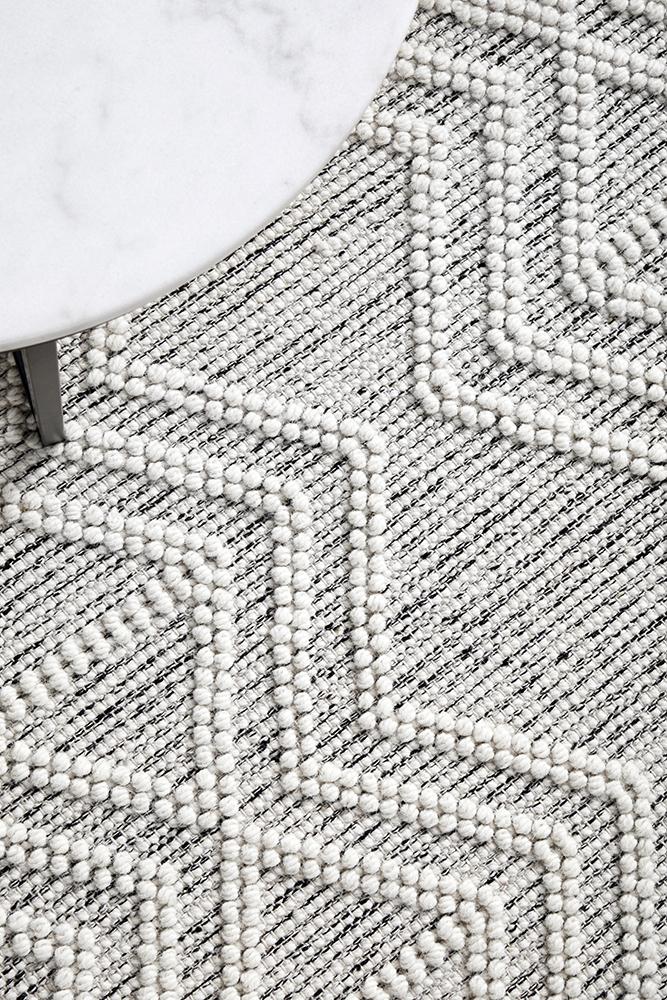 Pure wool Maison Clara sweater by India, featuring a cozy, soft knit with a classic design and natural wool texture.