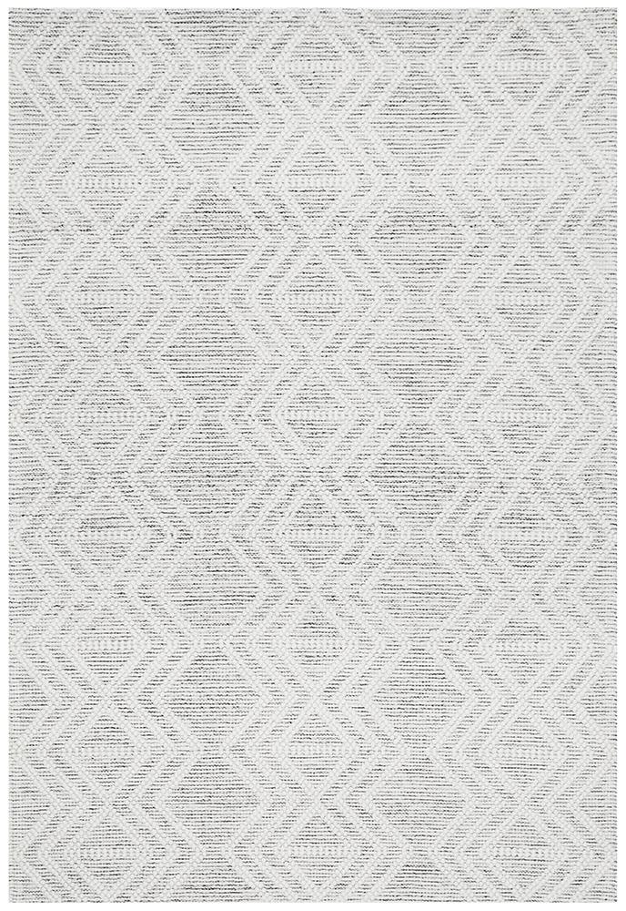 Pure wool Maison Clara sweater from India, featuring a cozy knit design and natural wool texture.