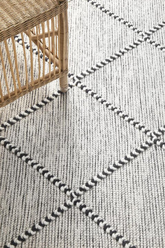 Pure wool Maison Jasmin textile from India, showcasing soft, high-quality fabric with intricate weaving details.