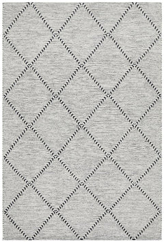 Pure wool Maison Jasmin textile by India, showcasing intricate woven patterns and soft, natural wool fibers.