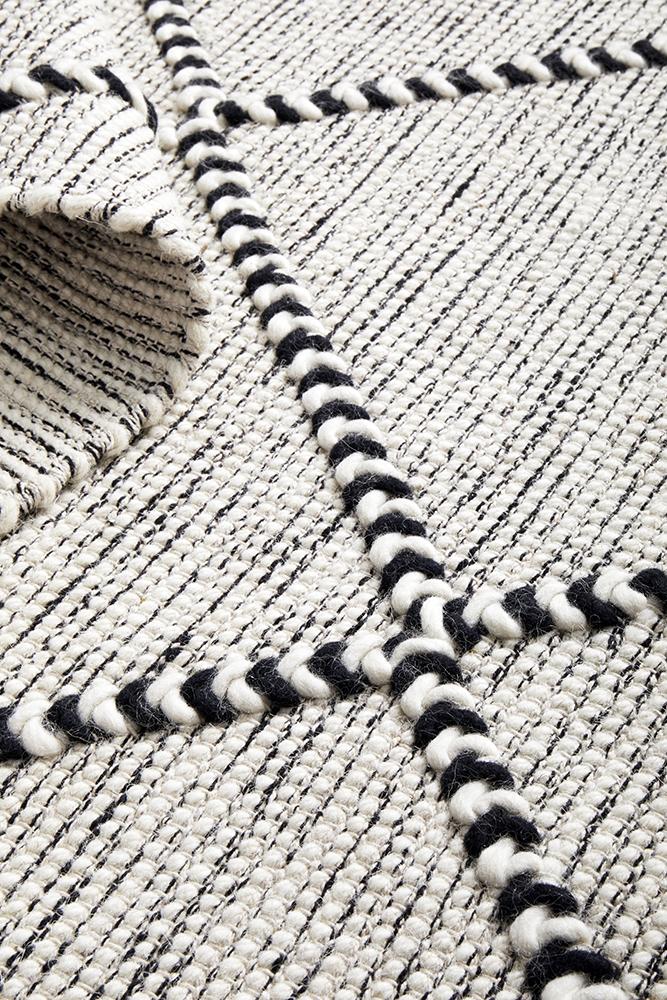 Pure wool textile from Maison Jasmin, showcasing intricate craftsmanship and soft, natural fibers from India.