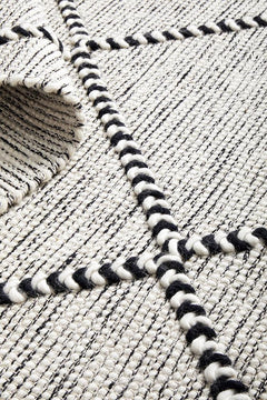 Pure wool textile from Maison Jasmin, showcasing intricate craftsmanship and soft, natural fibers from India.