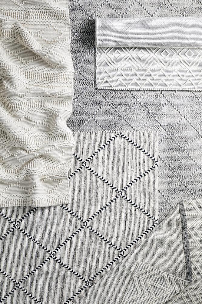 Pure wool Maison Jasmin scarf with intricate design, crafted by India, showcased in the image.