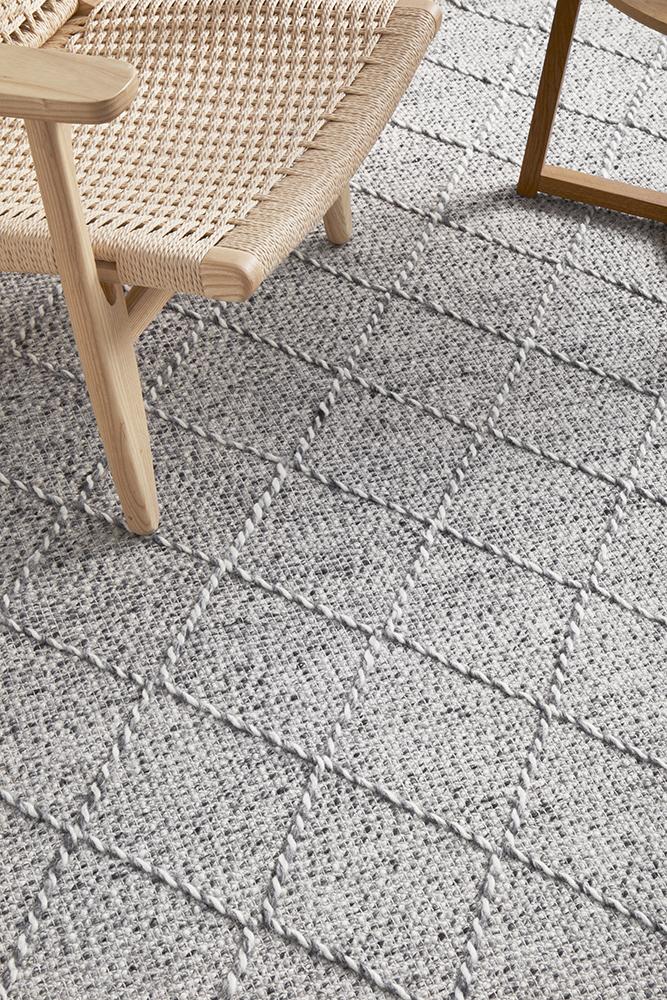 Close-up of Maison Noah pure wool fabric by India showing soft, textured wool fibers and intricate weaving details.