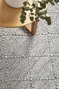 Pure wool fabric from Maison Noah by India, shown in a close-up image highlighting its texture and natural wool fibers.