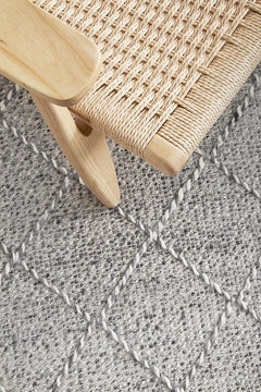 Pure wool Maison Noah scarf from India, featuring intricate woven details and soft, luxurious texture.