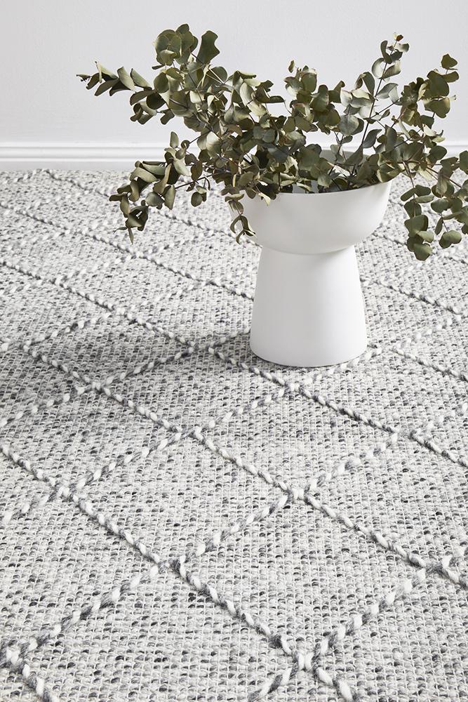 Pure wool blanket by Maison Noah, crafted in India, featuring soft, high-quality wool with a cozy, textured design.
