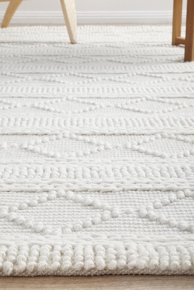 India Maison Zoe pure wool garment shown in the image, highlighting the texture and style of the wool product.