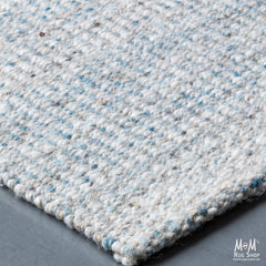India Bungalow Denim Pure Wool Rug featuring a durable denim-inspired design with intricate patterns and rich blue tones.