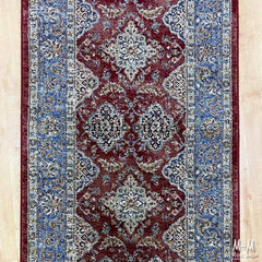 Belgium Da Vinci Red & Blue Heat Set Polypropylene runner, 80cm wide, with vibrant red and blue pattern on a woven textile.