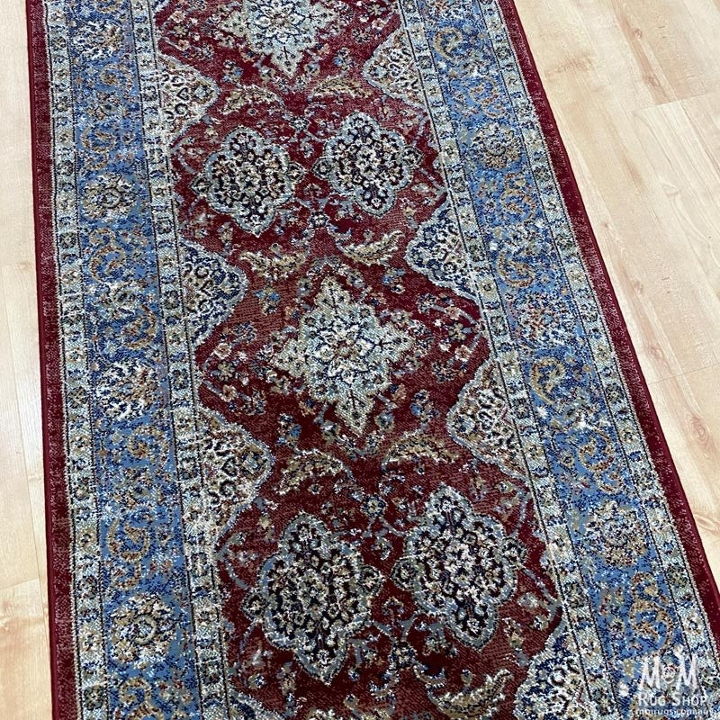 Belgium Da Vinci Red & Blue Heat Set Polypropylene runner, 80 cm wide, showcasing vibrant red and blue pattern on textured fabric.