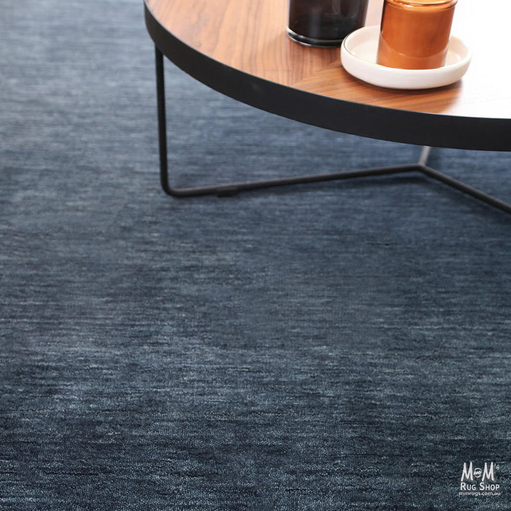 Blue Diva Odyssey pure wool rug from India, showcasing intricate patterns and soft texture in a close-up view.