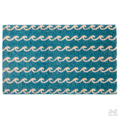 Blue waves patterned PVC coir doormat in various sizes from M and M's Rug Shop, showing textured surface and vibrant design.