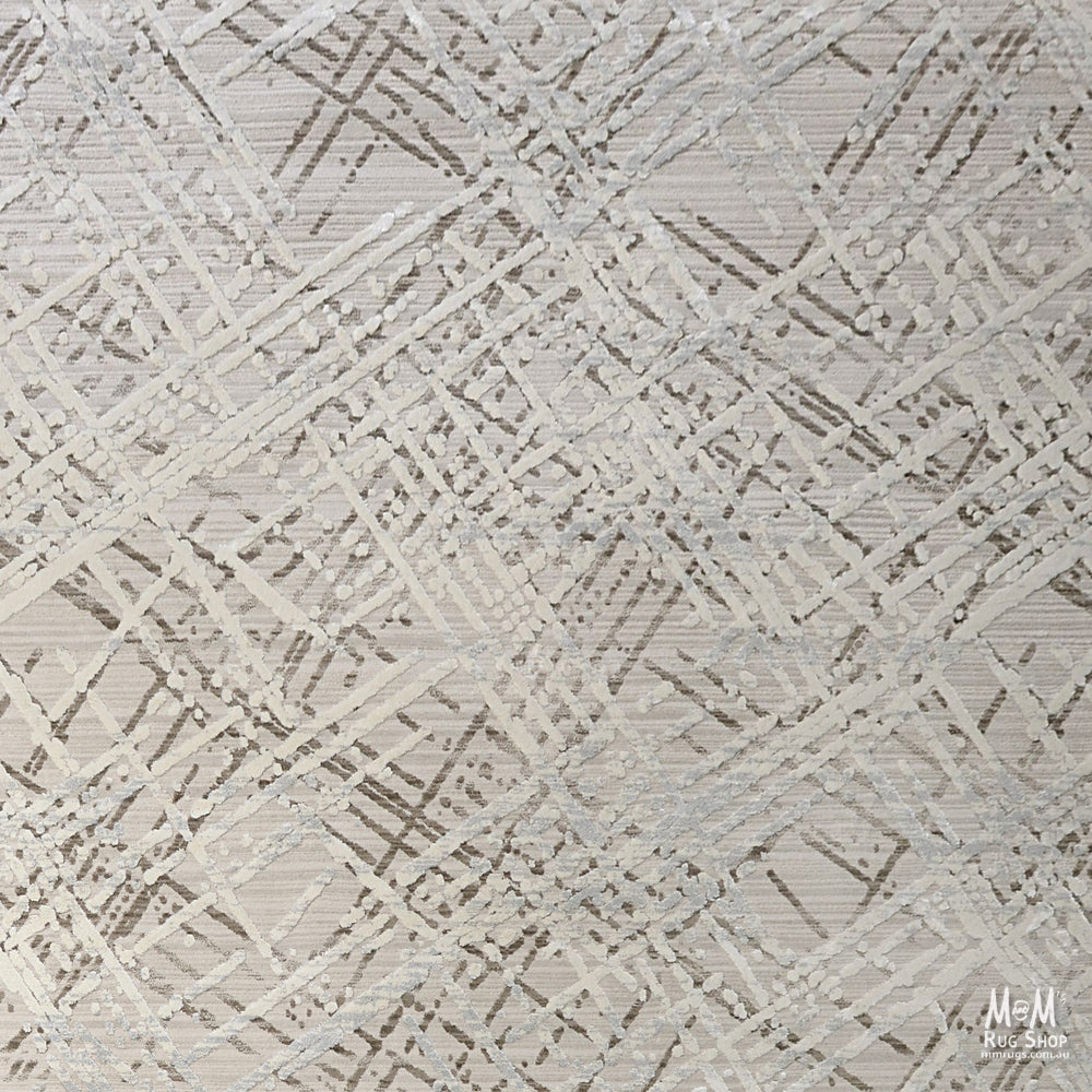 Turkey France Latte polyester rug with a soft, textured design featuring elegant patterns in neutral tones.