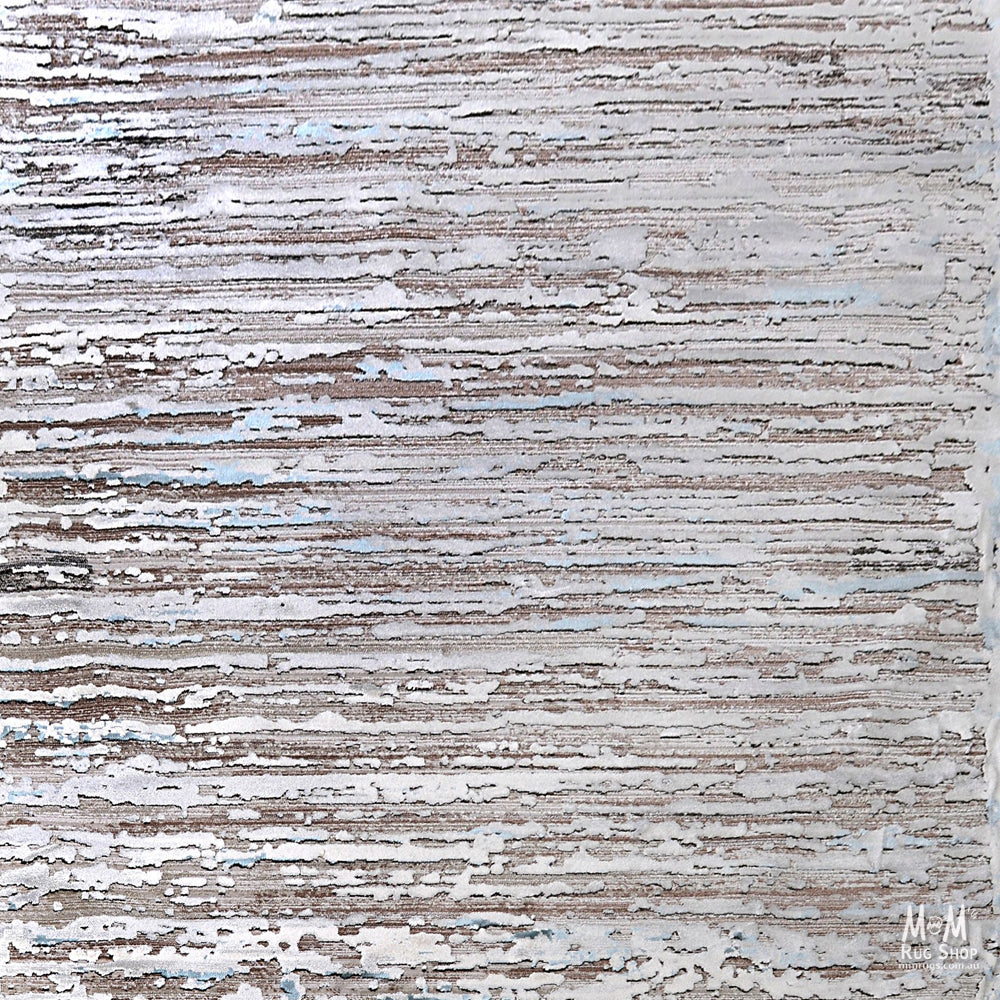 France Silver polyester rug with intricate silver and gray patterns, crafted in Turkey, showcasing a luxurious and elegant design.