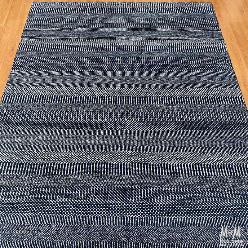 Deep dark blue Hamilton pure wool rug with intricate patterns, crafted by India, showcasing high-quality wool and craftsmanship.