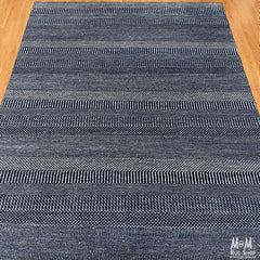 Deep dark blue Hamilton pure wool rug with intricate patterns, crafted by India, showcasing high-quality wool and craftsmanship.