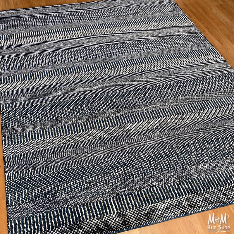 Hamilton Pure Wool Rug in Deep Dark Blue, Indian-made, showcasing a soft, plush texture with intricate woven patterns.