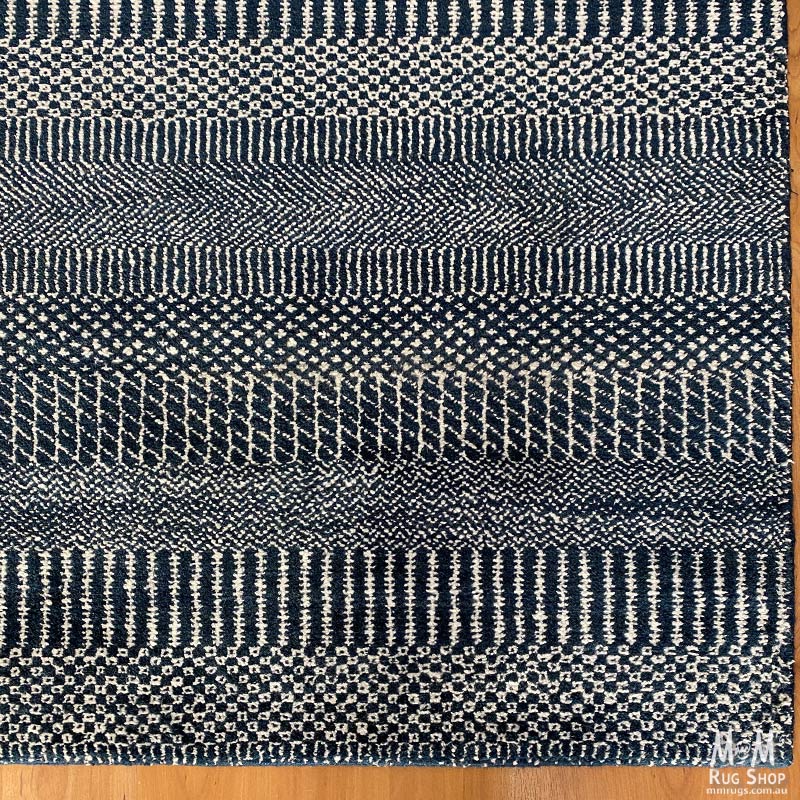 Hamilton Pure Wool Rug in Deep Dark Blue, Indian-made, showcasing a soft, textured deep blue design ideal for home decor.
