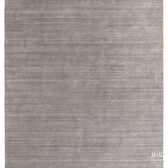 Wool and linen Latitude Plateau rug with geometric pattern, crafted by India, showcasing soft textures and intricate design.