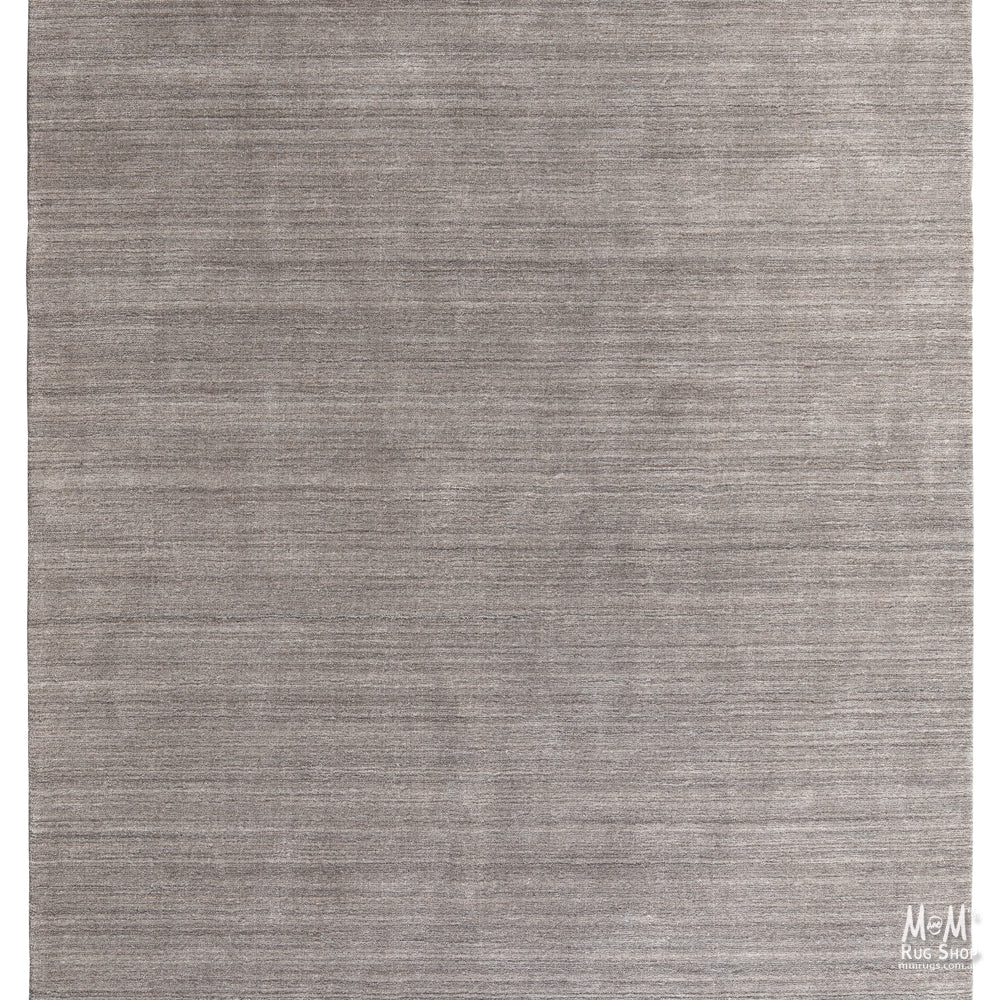 Wool and linen Latitude Plateau rug with geometric pattern, crafted by India, showcasing soft textures and intricate design.