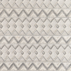 India Memphis Maya pure wool rug with intricate patterns in warm earthy tones, showcasing traditional craftsmanship.