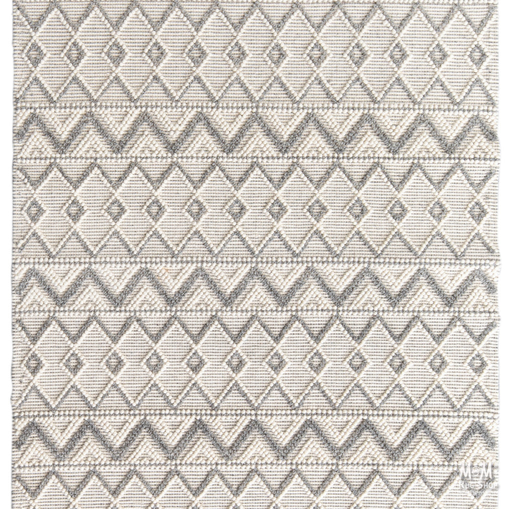 India Memphis Maya pure wool rug with intricate geometric patterns and vibrant colors, showcasing traditional craftsmanship.