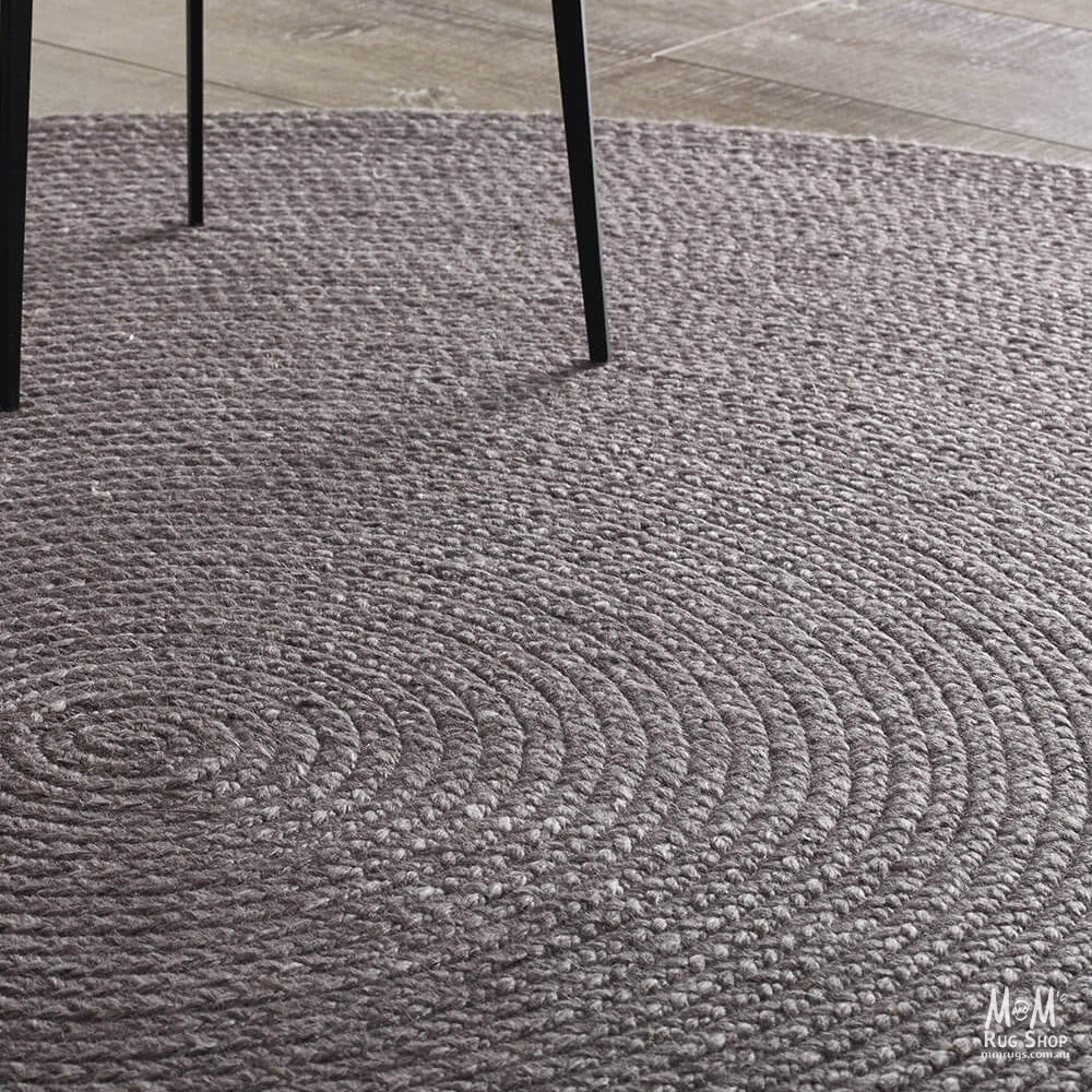 Charcoal wool and viscose Paddington rug by India, showcasing a soft, textured woven surface with subtle pattern details.