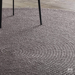 Charcoal wool and viscose Paddington rug by India, showcasing a soft, textured woven surface with subtle pattern details.
