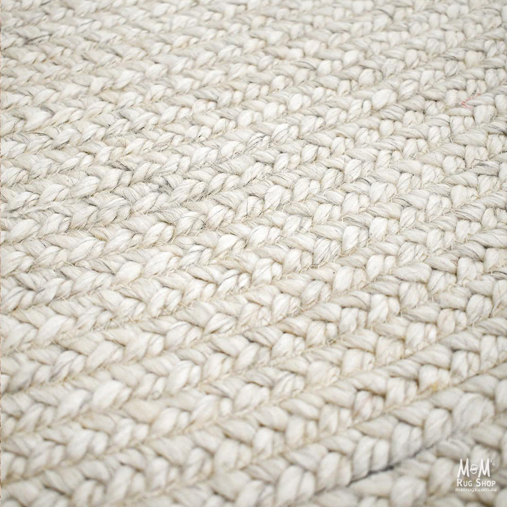 Wool and viscose Paddington Snow rug by India featuring a soft, textured snow-inspired pattern in neutral tones.