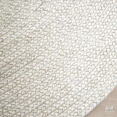 India Paddington Snow wool and viscose rug with a soft, textured surface in a cozy, neutral color.