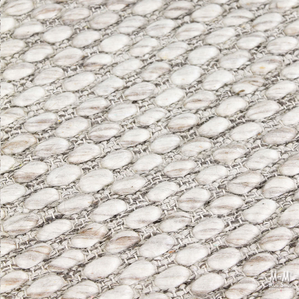 India Palmas Beige pure wool rug with intricate patterns, showcasing soft texture and neutral beige color for elegant home decor.