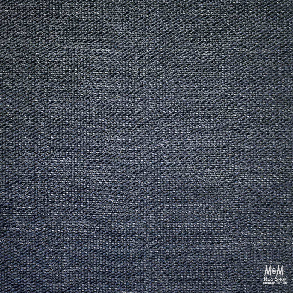 India Palmas Midnight Blue pure wool rug with intricate design, showcasing deep blue and subtle patterns on a soft, plush surface.