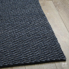 India Palmas Midnight Blue pure wool rug featuring a deep blue color and intricate patterns on a plush surface.