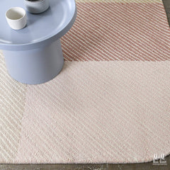 India Pinstripe Blossom pure wool rug featuring a pinstripe pattern and floral design, showcasing intricate craftsmanship and soft texture.