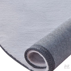 Supersoft gray polyester pony round rug featuring a plush, cozy design suitable for children's rooms or play areas.