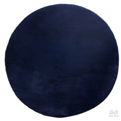 Soft navy round pony rug made of supersoft polyester with a smooth texture, designed for comfort and durability.
