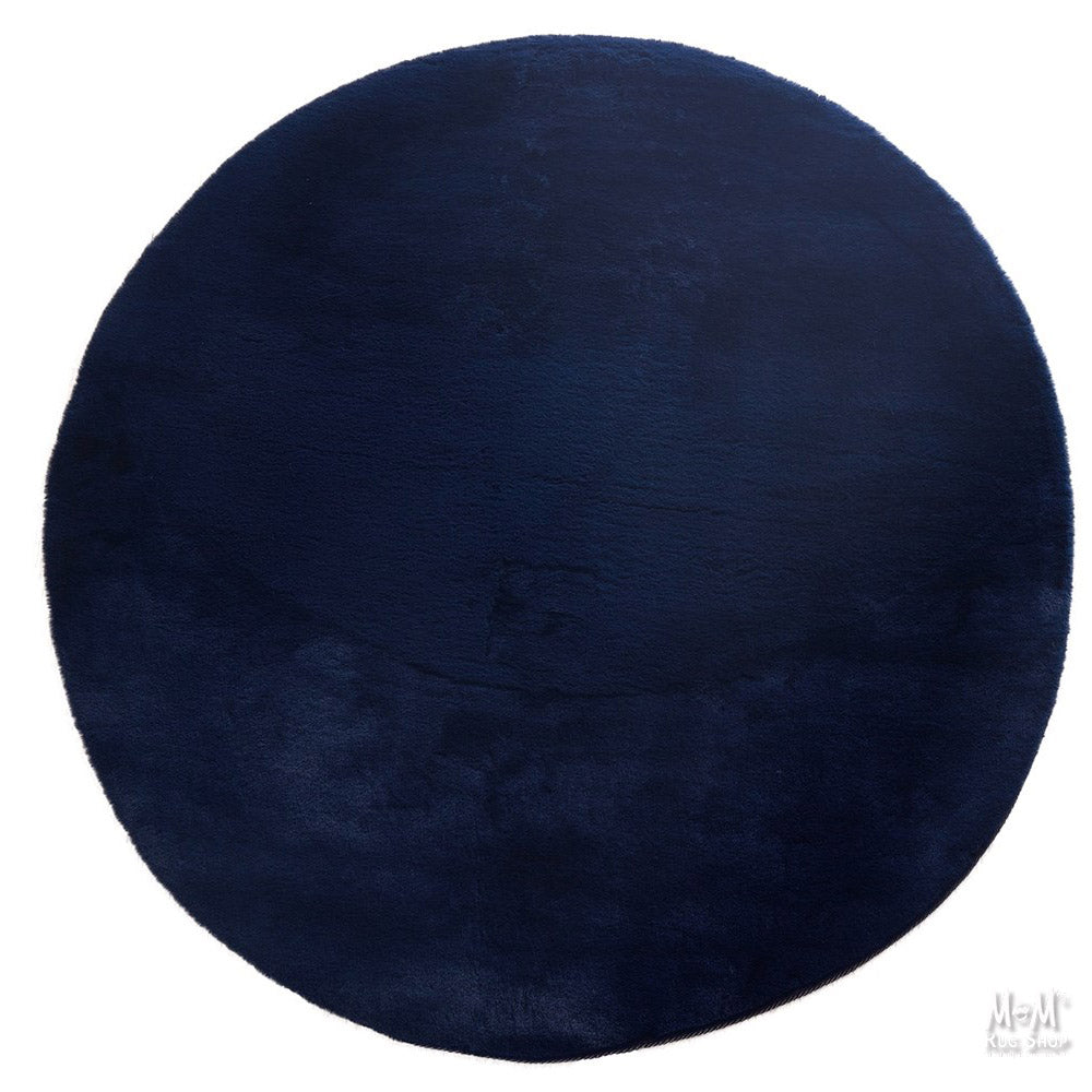 Soft navy round pony rug made of supersoft polyester with a smooth texture, designed for comfort and durability.