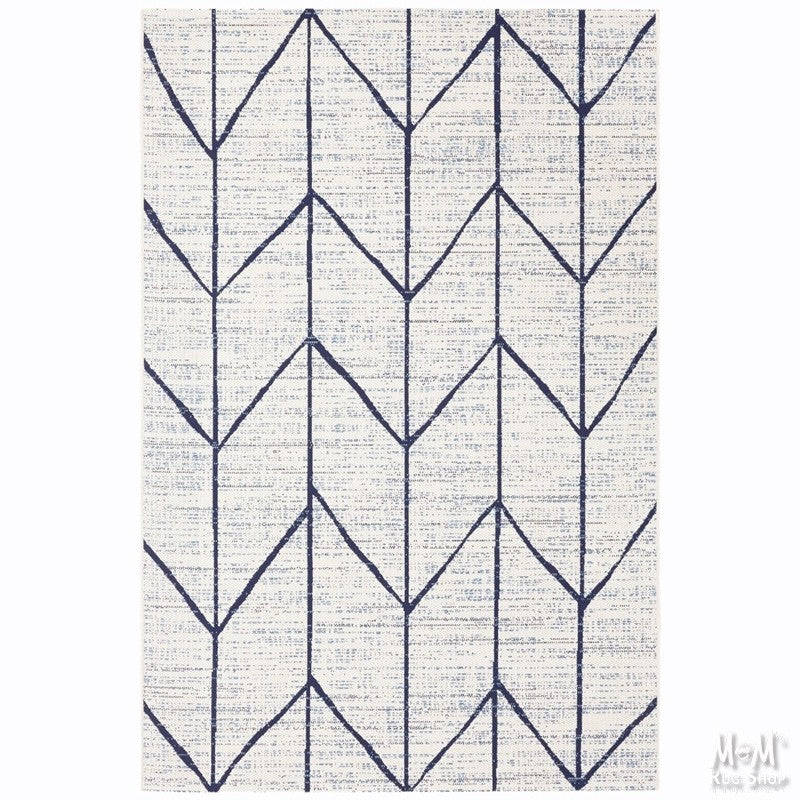 Navy polypropylene Prisma Arrow rug by Belgium with geometric arrow pattern, textured surface, and soft pile.