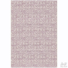 Pink polypropylene Prisma Triline Belgium rug with geometric pattern, showcasing soft texture and vibrant color.