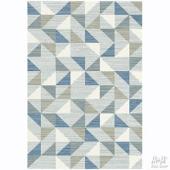 Blue polypropylene Prisma Triangles rug with geometric triangle pattern, crafted by Belgium, featuring a vibrant modern design.
