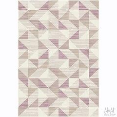 Pink polypropylene Prisma Triangles rug with geometric triangle pattern, crafted by Belgium, showcasing vibrant design and soft texture.