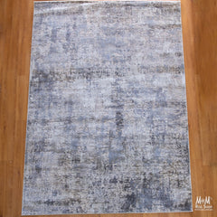 Turkish Raj Taupe polyester pile rug showing soft taupe color and textured surface in a close-up view.