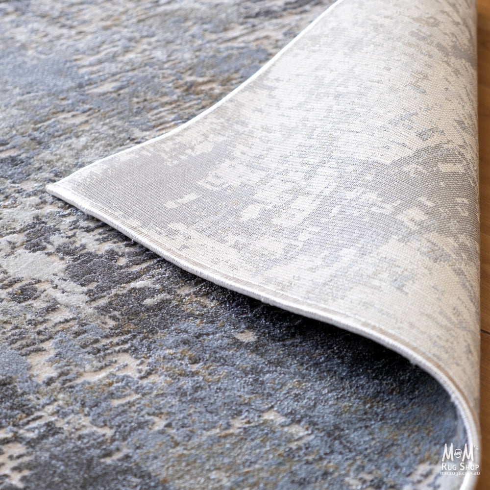 Turkish Raj Taupe polyester pile rug with soft, plush texture and taupe color, suitable for modern home decor.
