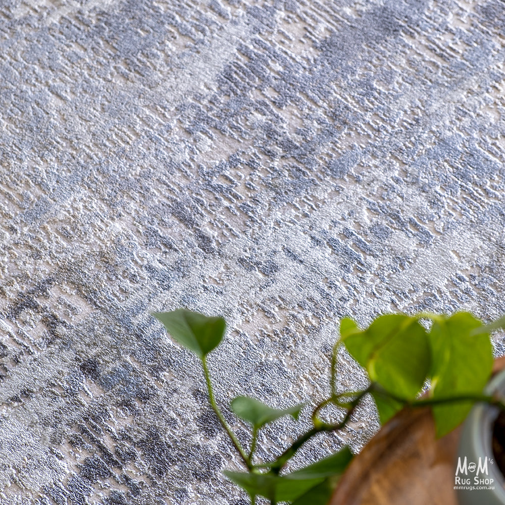 Turkish Raj Taupe polyester pile rug with soft, plush texture and taupe color, perfect for adding warmth to living spaces.