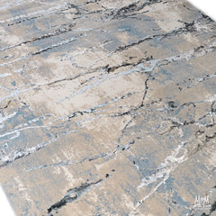 Turkish Swiss Silver polyester pile rug with intricate silver-toned pattern, soft texture, and detailed design.