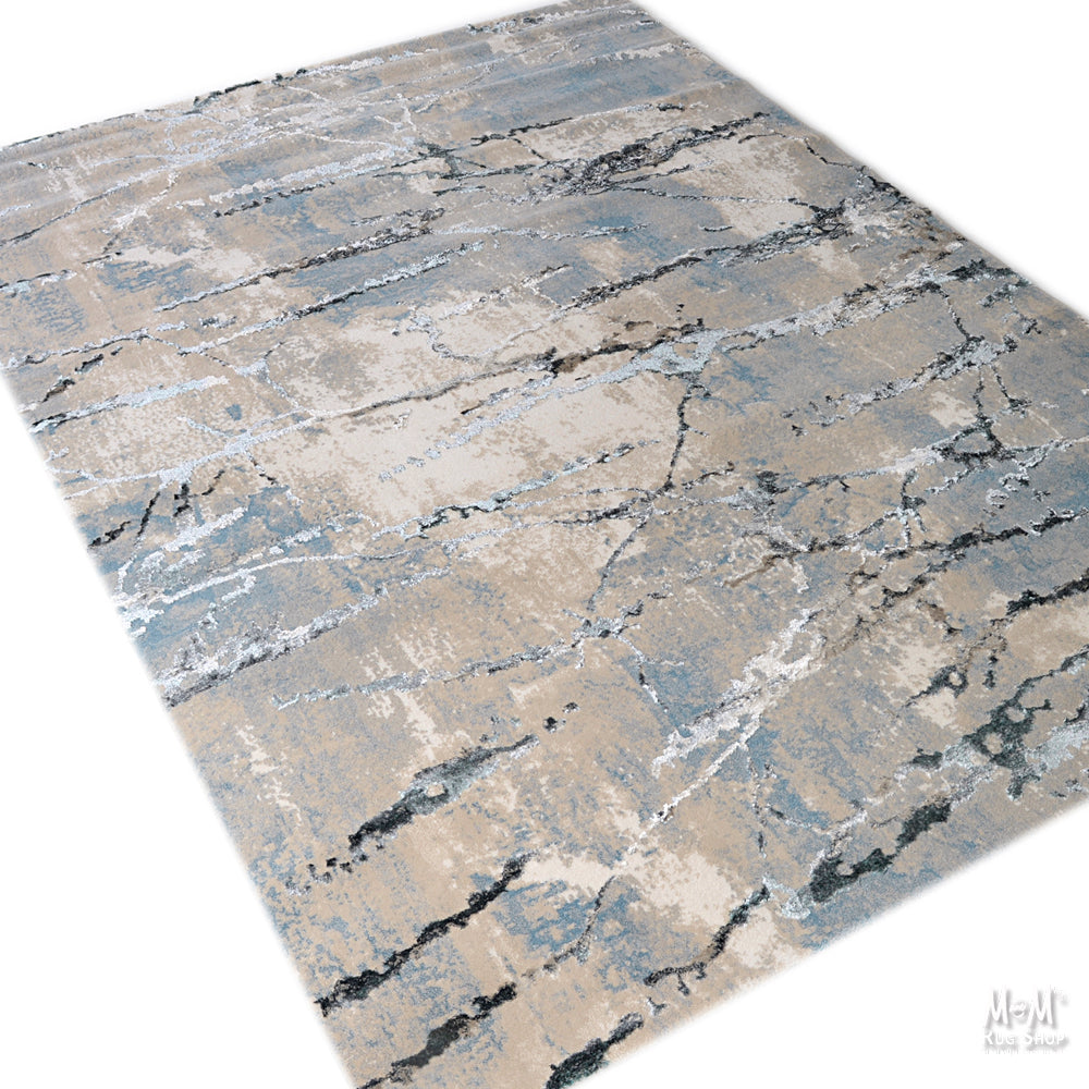 Turkish Swiss Silver polyester pile rug with intricate silver design and soft texture, showcasing detailed craftsmanship.