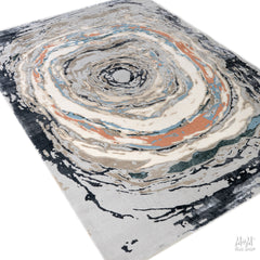 Turkish Swiss Thumb polyester pile rug displaying intricate geometric patterns in neutral tones.